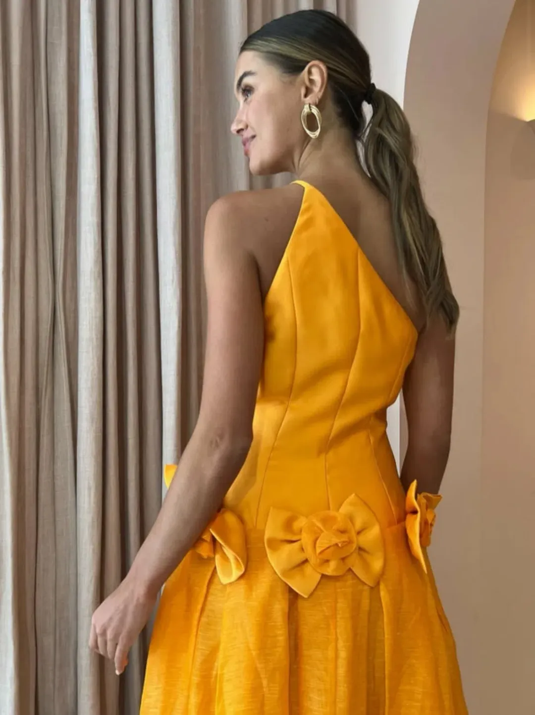 Alemais Macie One Shoulder Rosette Dress in Saffron Size 8  for rent on The Volte - main image