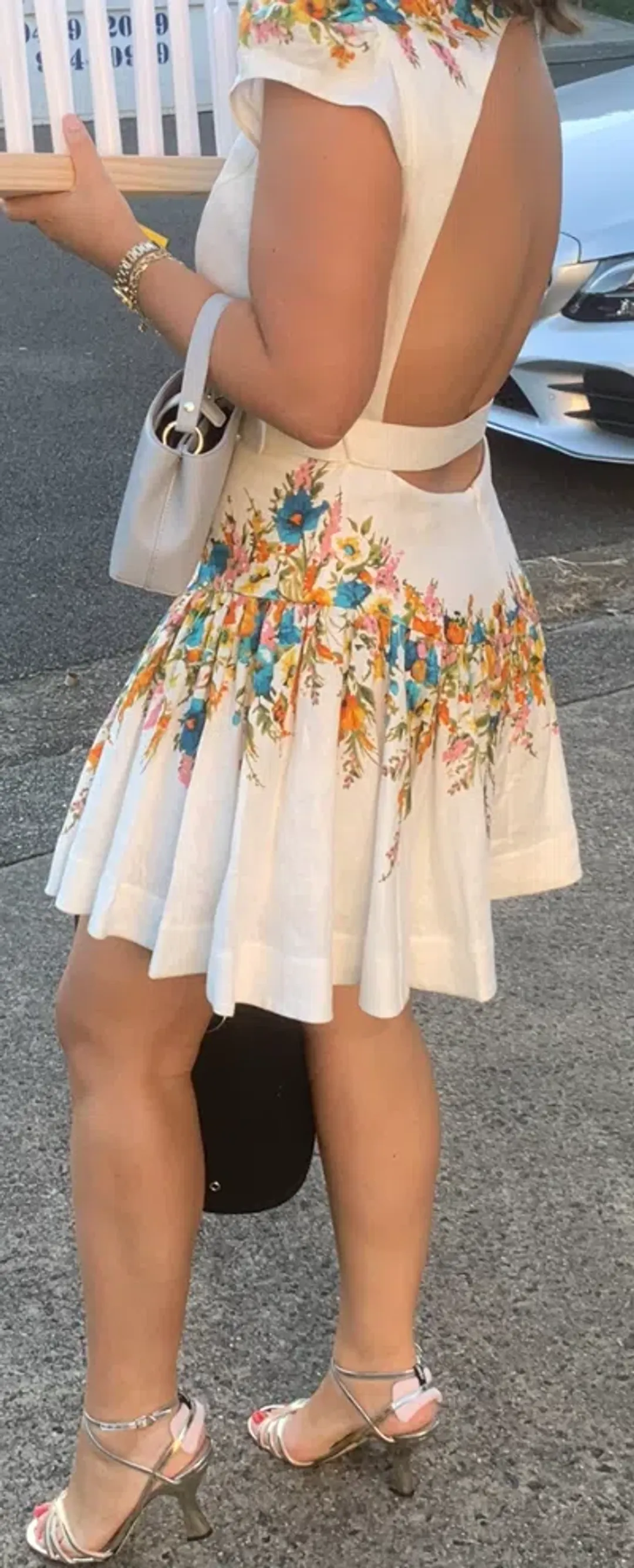 Zimmermann Estelle Tie Backless Mini Dress Cream Floral Size 3 / AU 14 for rent on The Volte - main image