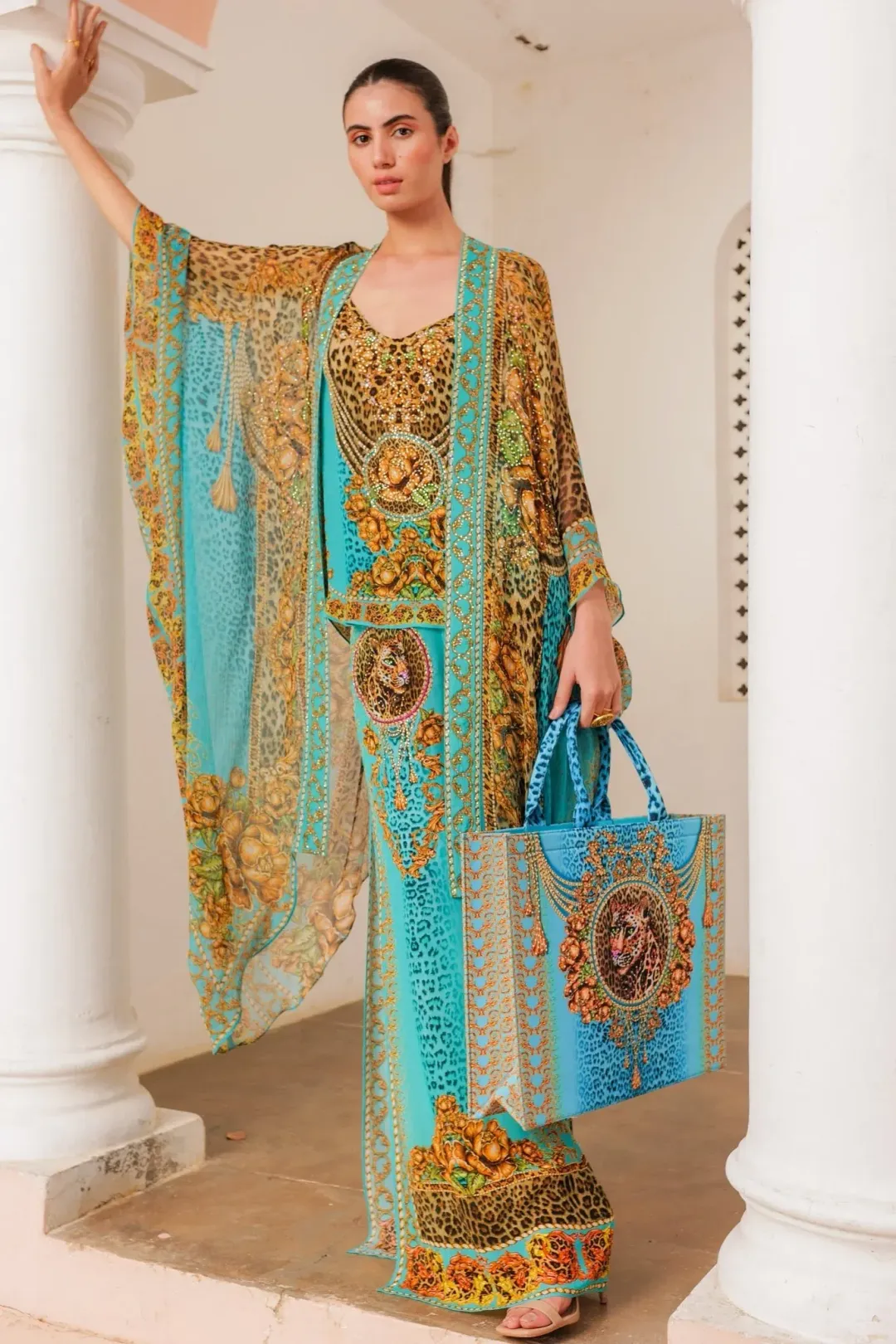 Czarina Aqua Leopardess Medium Cape Turquoise Leopard Print One Size for rent on The Volte - main image