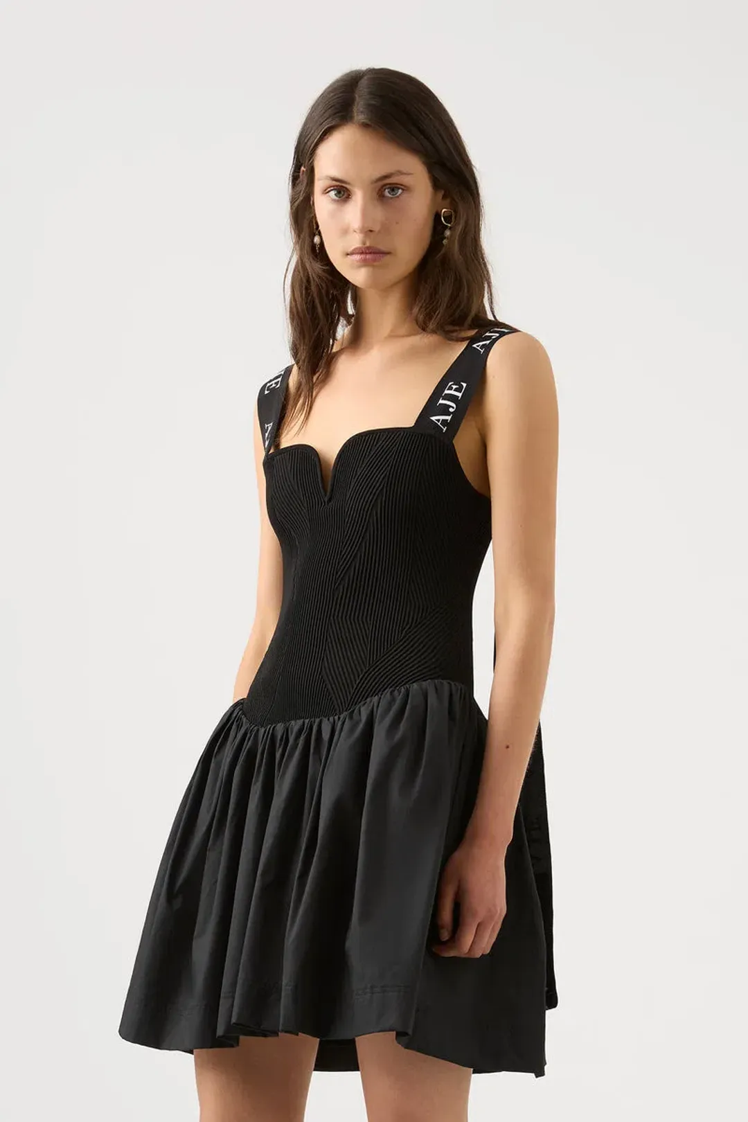 Aje Mira Logo Strap Tulip Mini Dress Black Size 8 for rent on The Volte - main image
