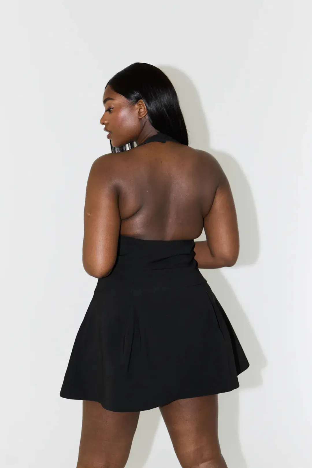 Odd Muse The Ultimate Muse Dropped Hem Mini Dress in Black  Size L / AU 12 for rent on The Volte - main image