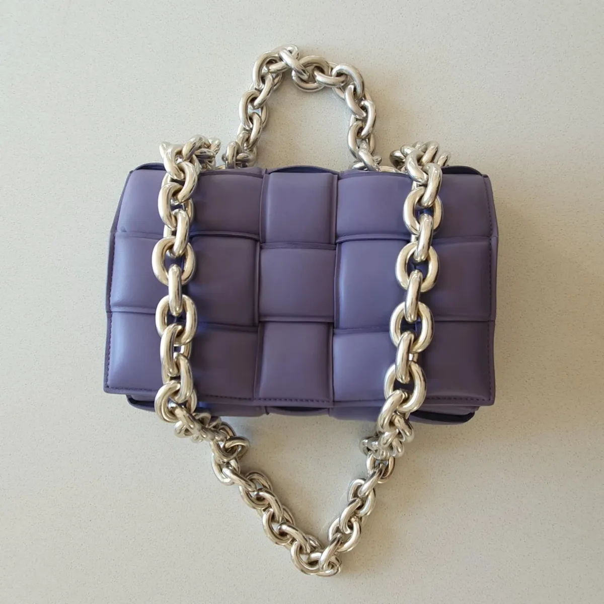 Bottega Veneta Chain Padded Cassette Bag Purple for rent on The Volte - main image