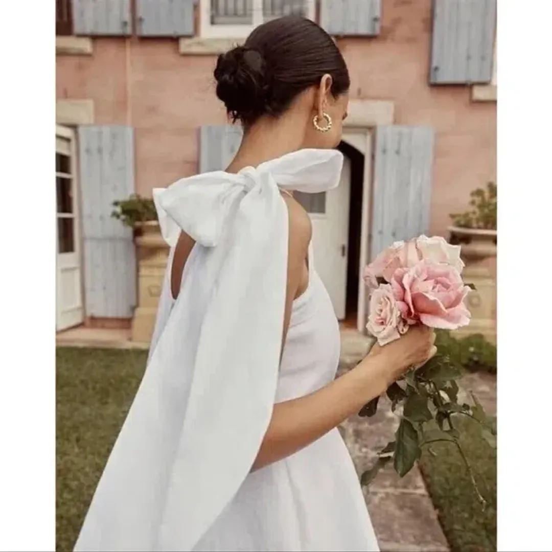 Dissh Aisle Bow Mini Dress White Size 8 for rent on The Volte - main image