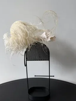 Morgan and Taylor Delicate Feather Fascinator Cream for rent on The Volte - image 1