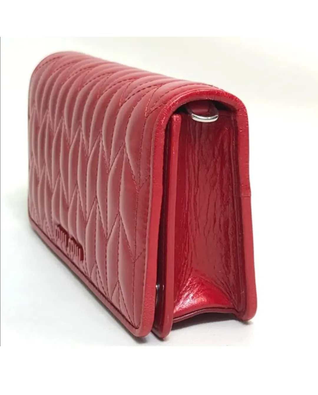 Miu Miu Matelasse Flap Clutch with removable strap Red for rent on The Volte - main image