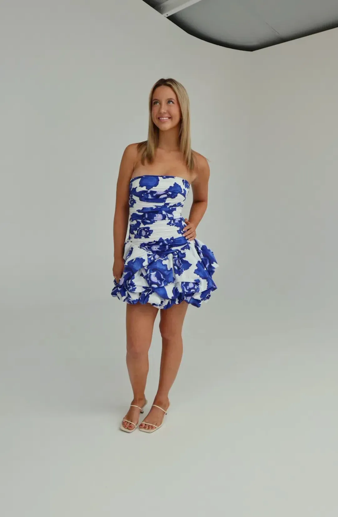 Aje Violette Bubble Hem Mini Dress in Boldly Blooming Cobalt Size AU 8 for rent on The Volte - main image