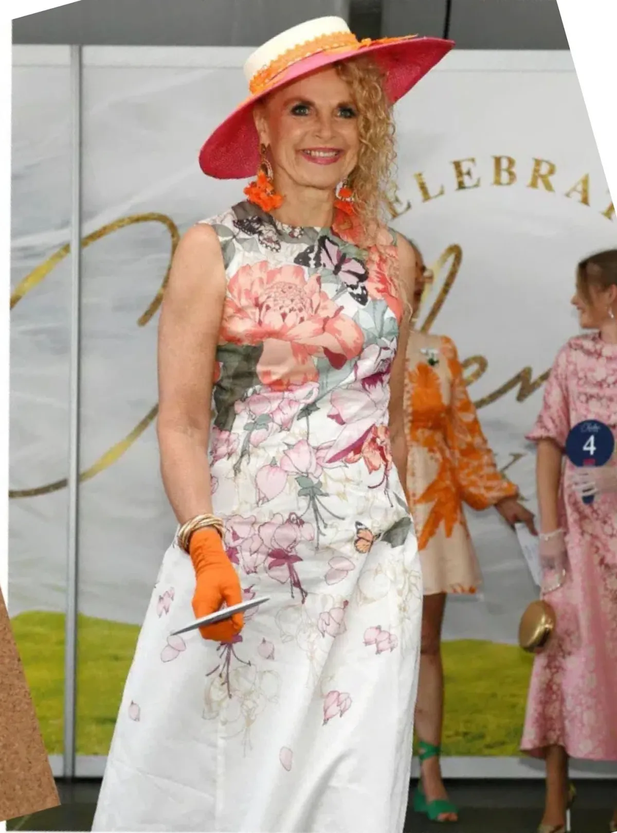 Sonlia Fashion Fascinator in Pink and Orange for rent on The Volte - main image