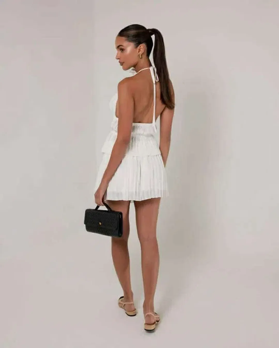 Heiress Beverly Hills Pleated Top and Mini Skirt Set Cream Size 10 for rent on The Volte - main image