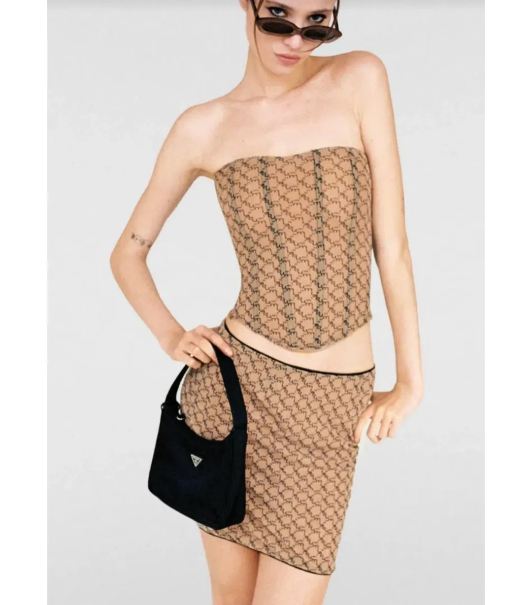 Miaou Peri Corset and Mini Moni Skirt in Nude Monogram Set Size XS / AU 6 for rent on The Volte - main image