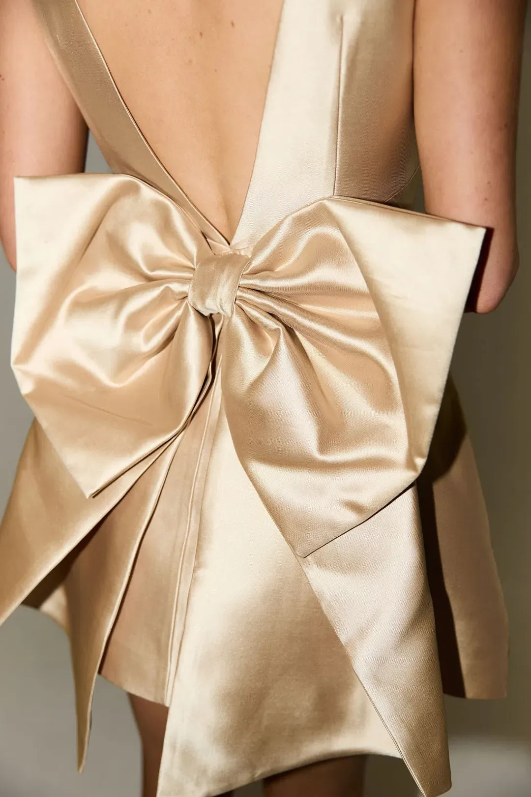 Odd Muse The Ultimate Muse Bow Detail Mini Dress Gold Size 6 for rent on The Volte - main image