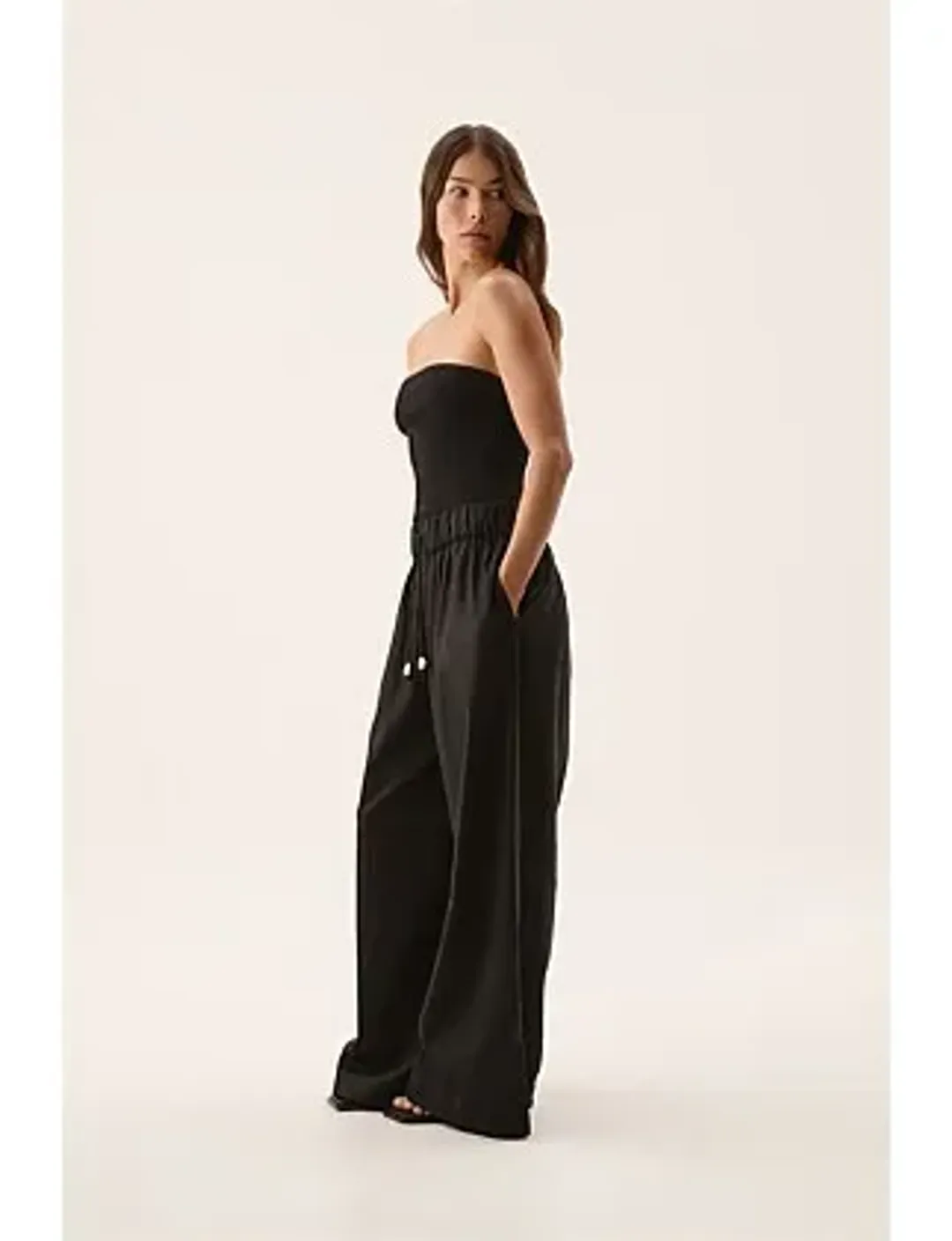 Aje Airlie Relaxed Pants in Black Size AU 8 for rent on The Volte - main image