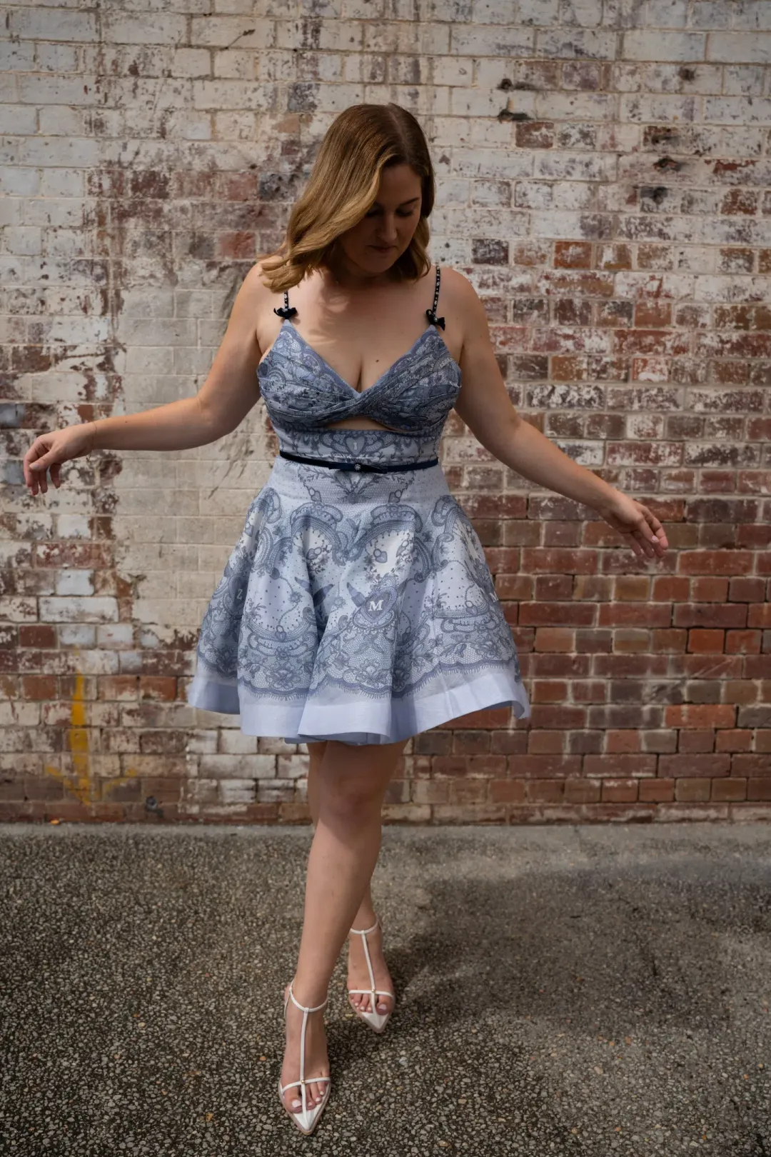 Zimmermann Crush Twist Front Mini Dress Print Size 4 / Aus 16 for rent on The Volte - main image