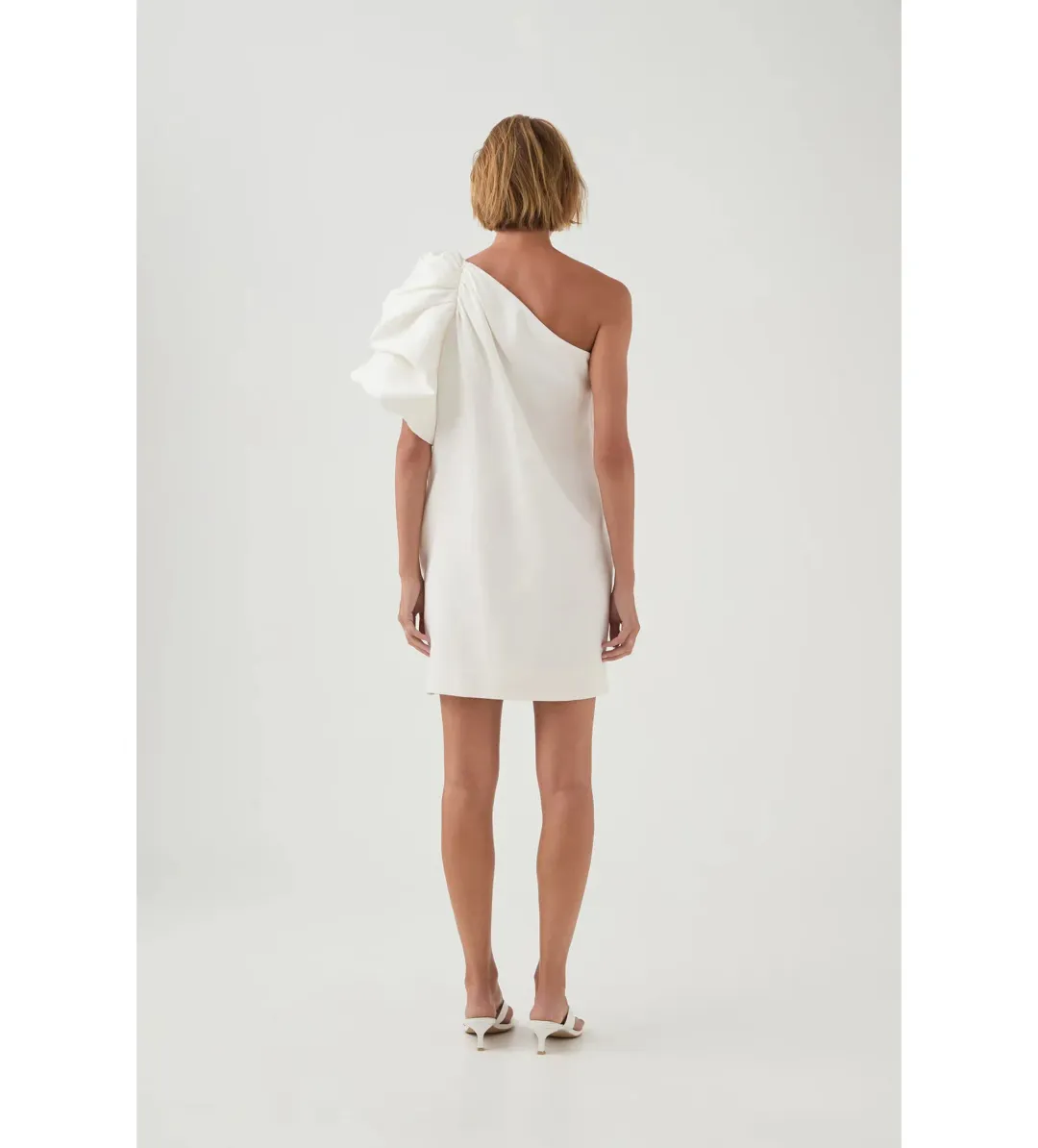 Aje Cira Mini Dress in Ivory Size M / AU 10 for rent on The Volte - main image
