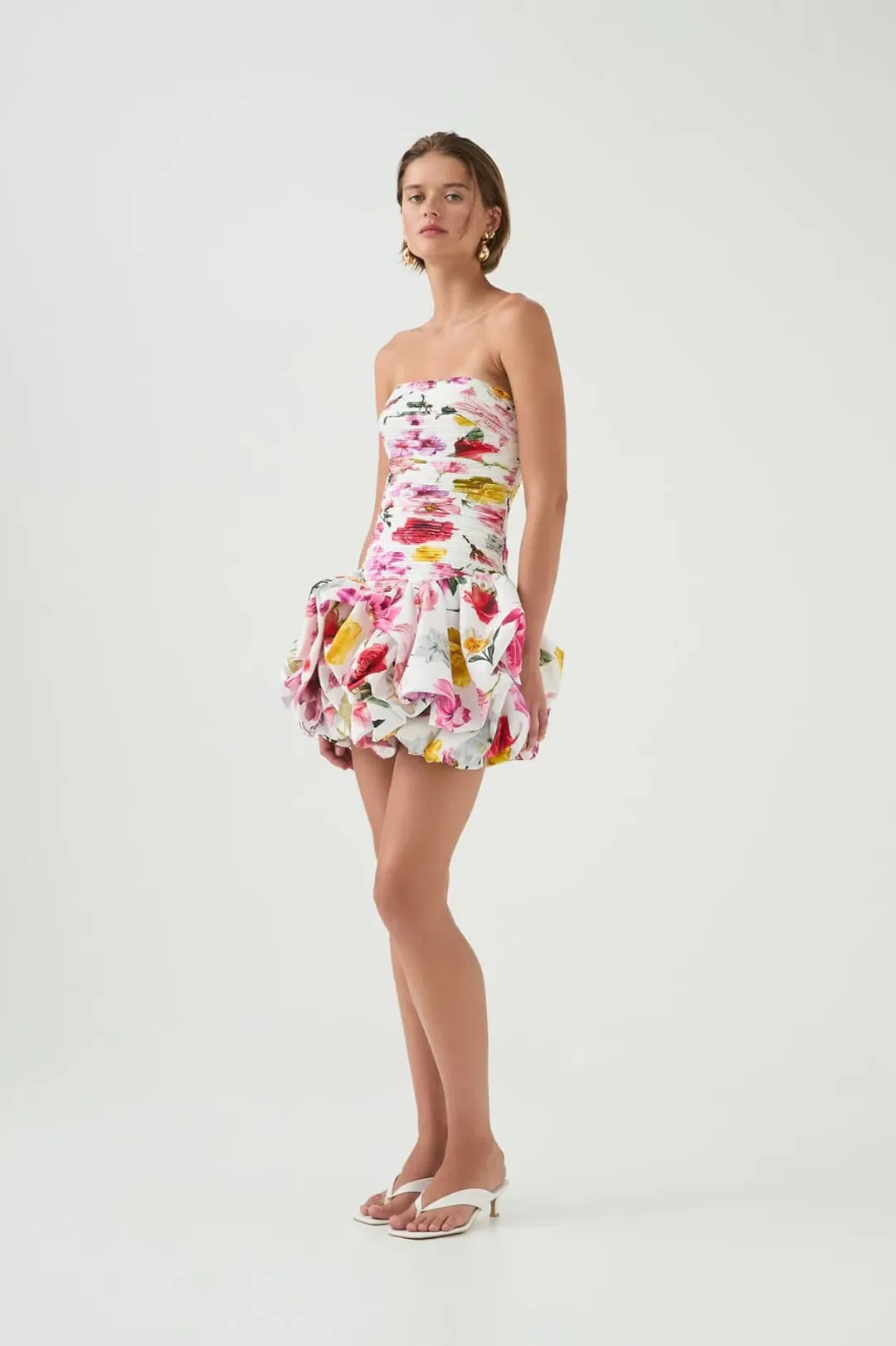 Aje Violette Bubble Hem Mini Dress Collage Floral Size AU 8 for rent on The Volte - main image