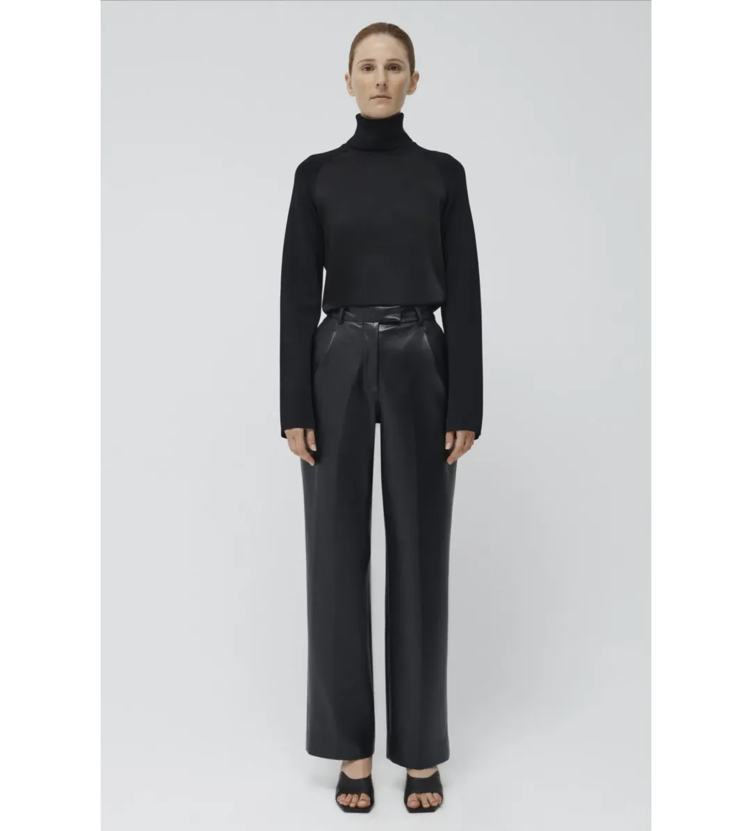 Simkhai Mateo Long Sleeve Turtleneck Top Black Size M/AU 12 for rent on The Volte - main image
