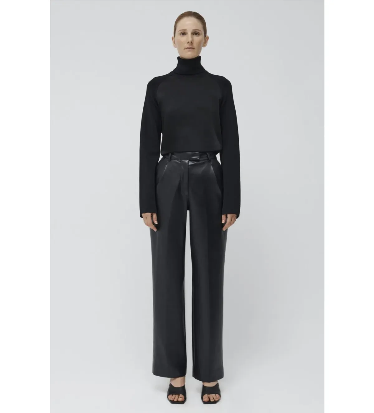 Simkhai Mateo Long Sleeve Turtleneck Top Black Size M/AU 12 for rent on The Volte - main image