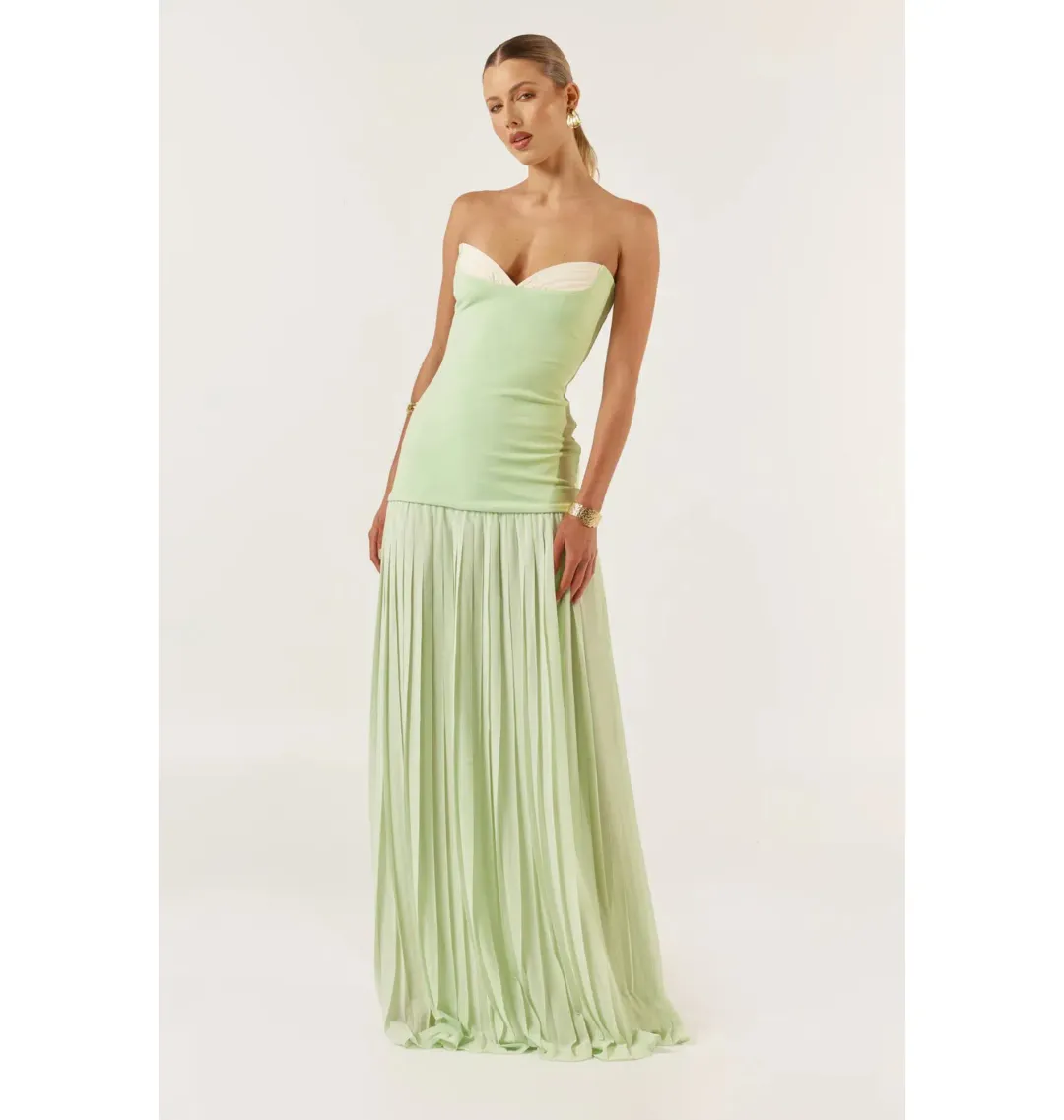 She is OLLÁ Nicolette Maxi Dress Green Size AU 6 for rent on The Volte - main image