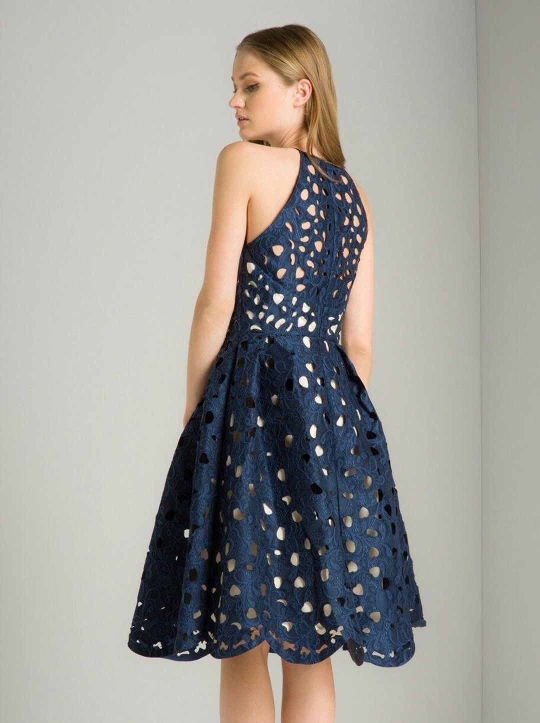 Chi Chi London Laser Cut Nessa Midi Dress Size 6 for rent on The Volte - main image