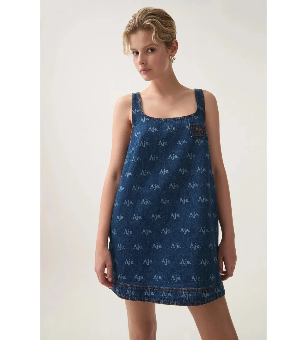 Aje Ratio Logo Denim Mini Dress Blue Print Size AU 6 for rent on The Volte - main image