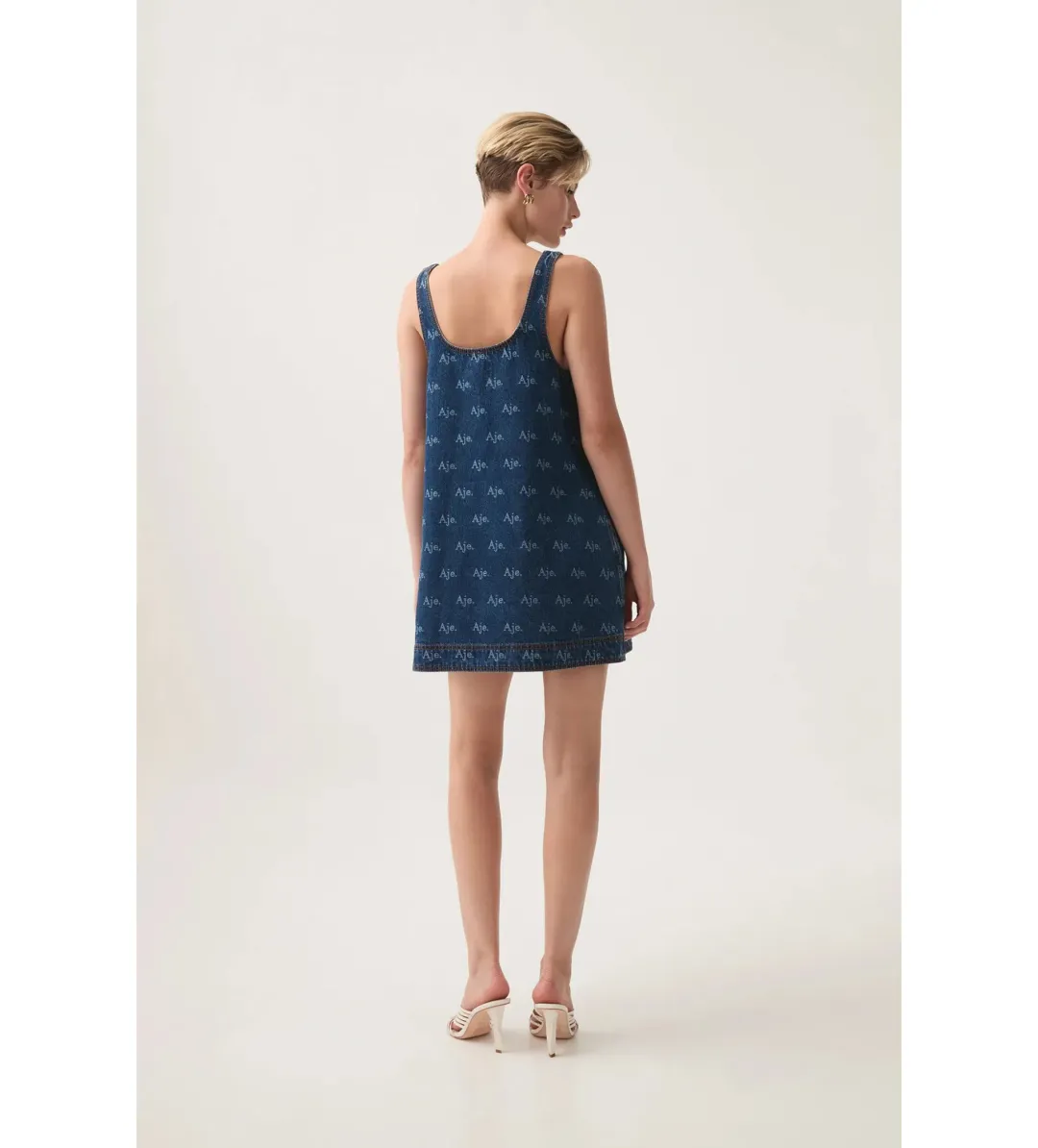 Aje Ratio Logo Denim Mini Dress Blue Print Size AU 6 for rent on The Volte - main image