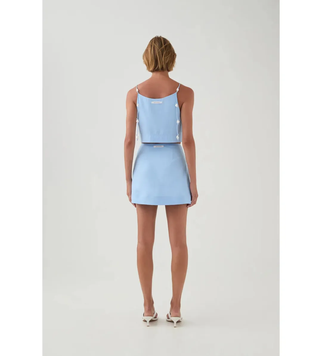 Aje Akoya Crop Top Size AU 4 and Mini Skirt Size AU 6 Set Cornflower Blue  for rent on The Volte - main image