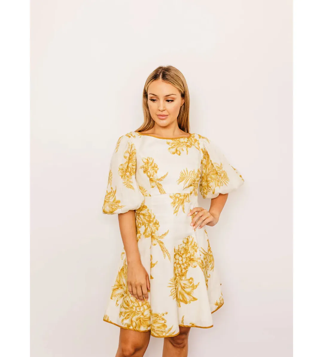 Zimmermann Empire Linen Puff Sleeve Mini Dress in Gold Size 0 /AU 8  for rent on The Volte - main image
