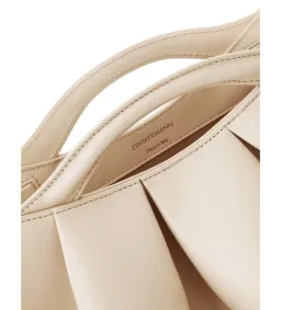 Zimmermann Calyxe Clutch in Almond for rent on The Volte - image 4