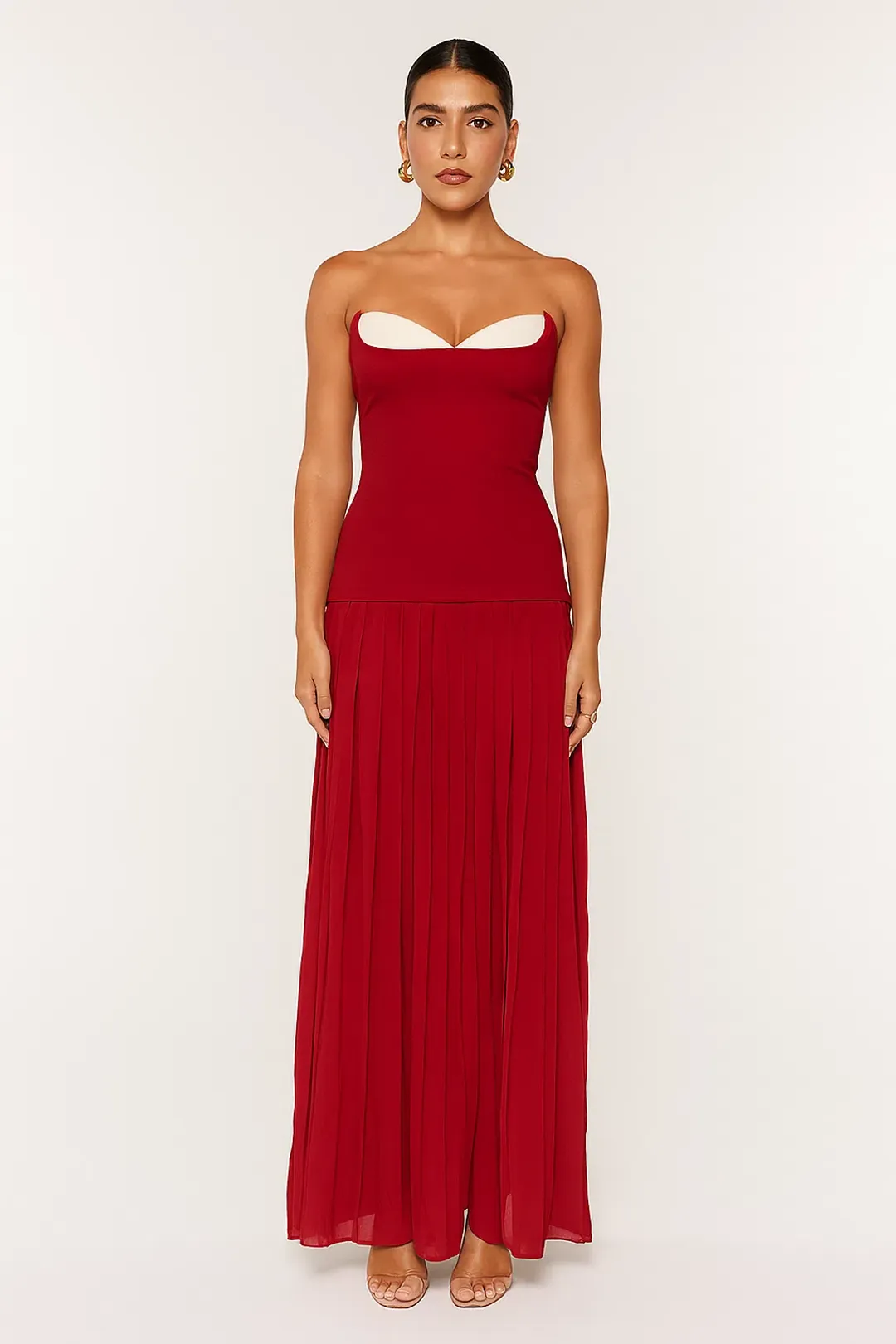 She is OLLÁ Nicolette Maxi Dress in Raspberry Size 6 for rent on The Volte - main image
