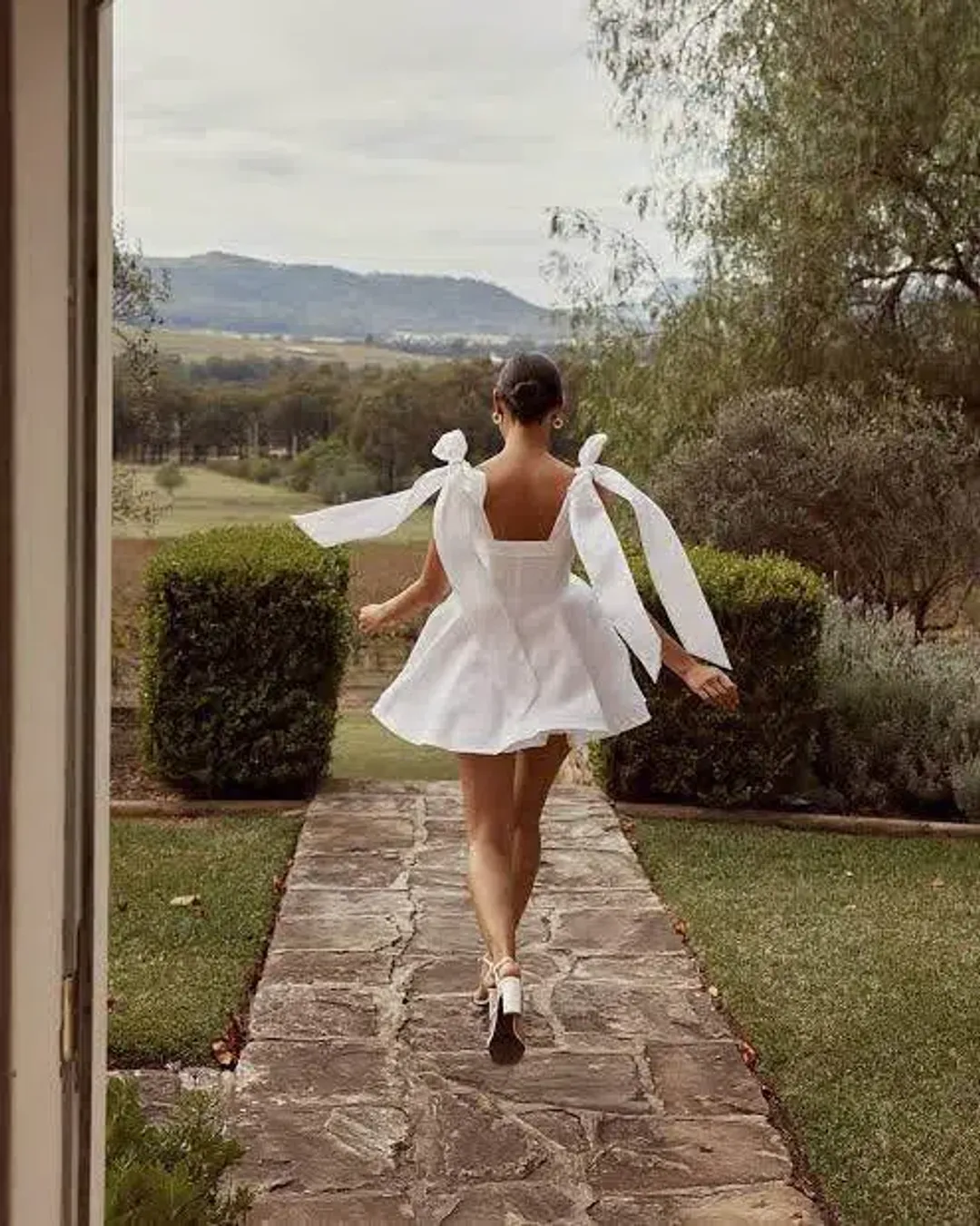 Dissh Aisle Linen Bow Tie Shoulder Mini Dress White Size AU 10  for rent on The Volte - main image