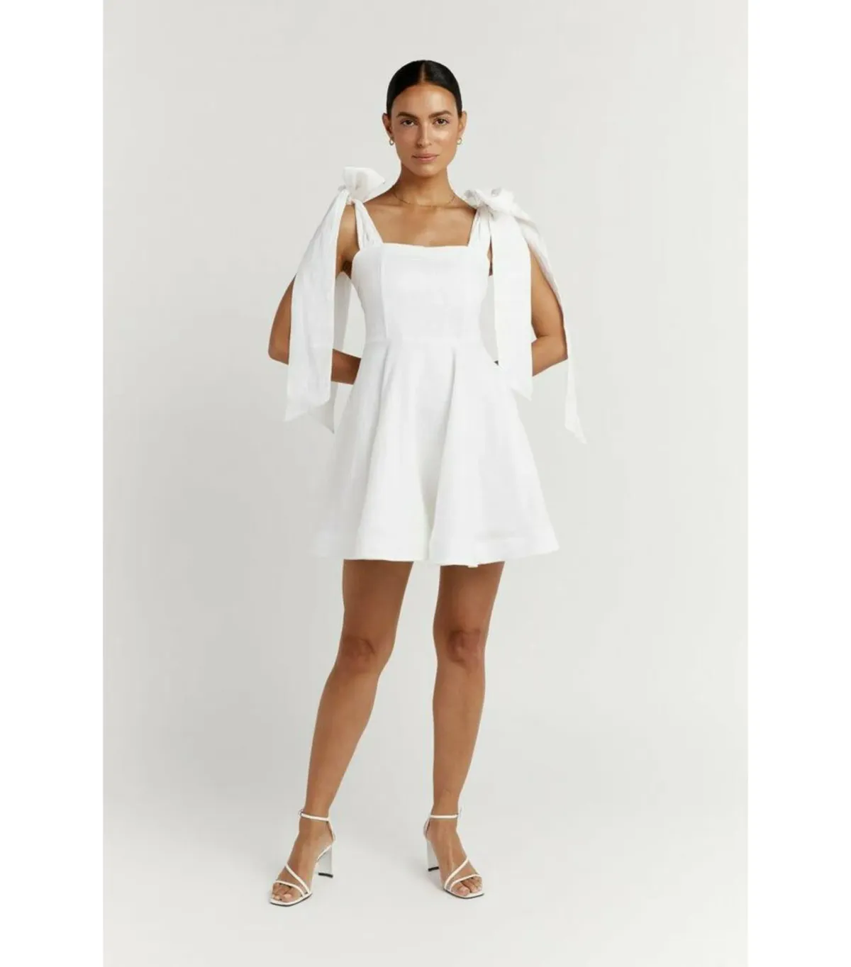 Dissh Aisle Linen Bow Tie Shoulder Mini Dress White Size AU 10  for rent on The Volte - main image