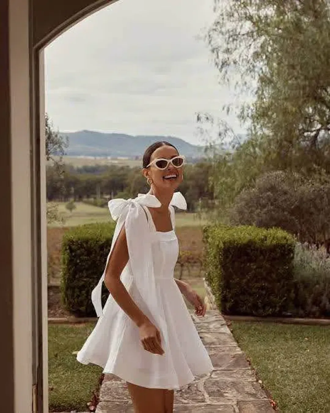 Dissh Aisle Linen Bow Tie Shoulder Mini Dress White Size AU 10  for rent on The Volte - main image