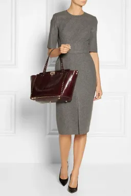 Victoria Beckham Grey wool mid-length dress for rent on The Volte - image 2