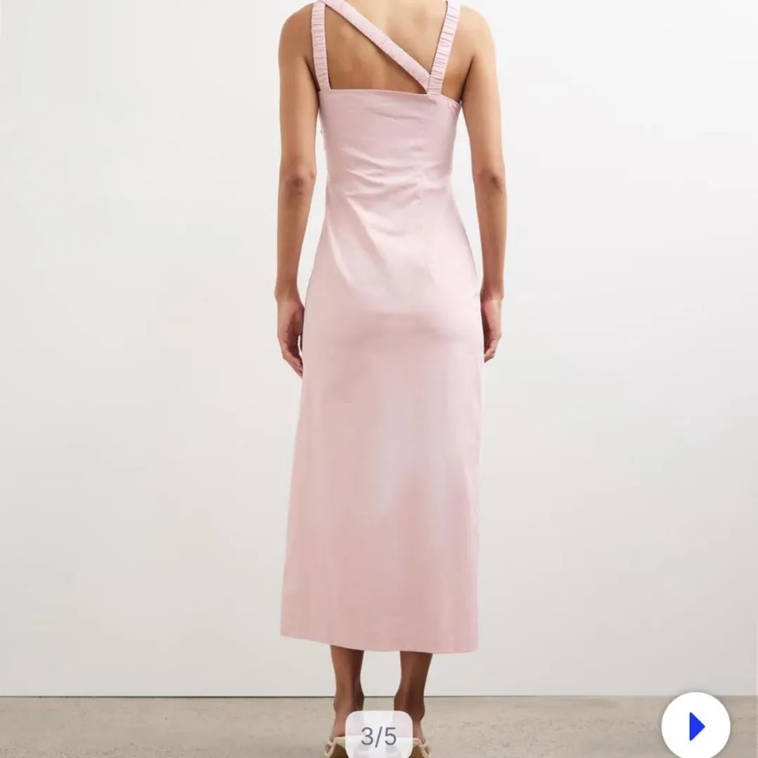 Lover Kilian Asymmetric Tuck Midi Dress in Baby Pink Size 10  for rent on The Volte - main image