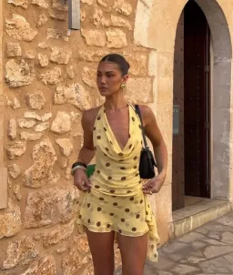 Benni Harlow Halter Mini / Yellow polka / Size 8 for rent on The Volte - image 1