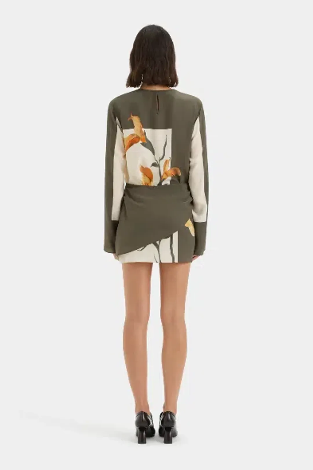 Constance Twist Mini Dress In Iris Green & Orange for rent on The Volte - main image