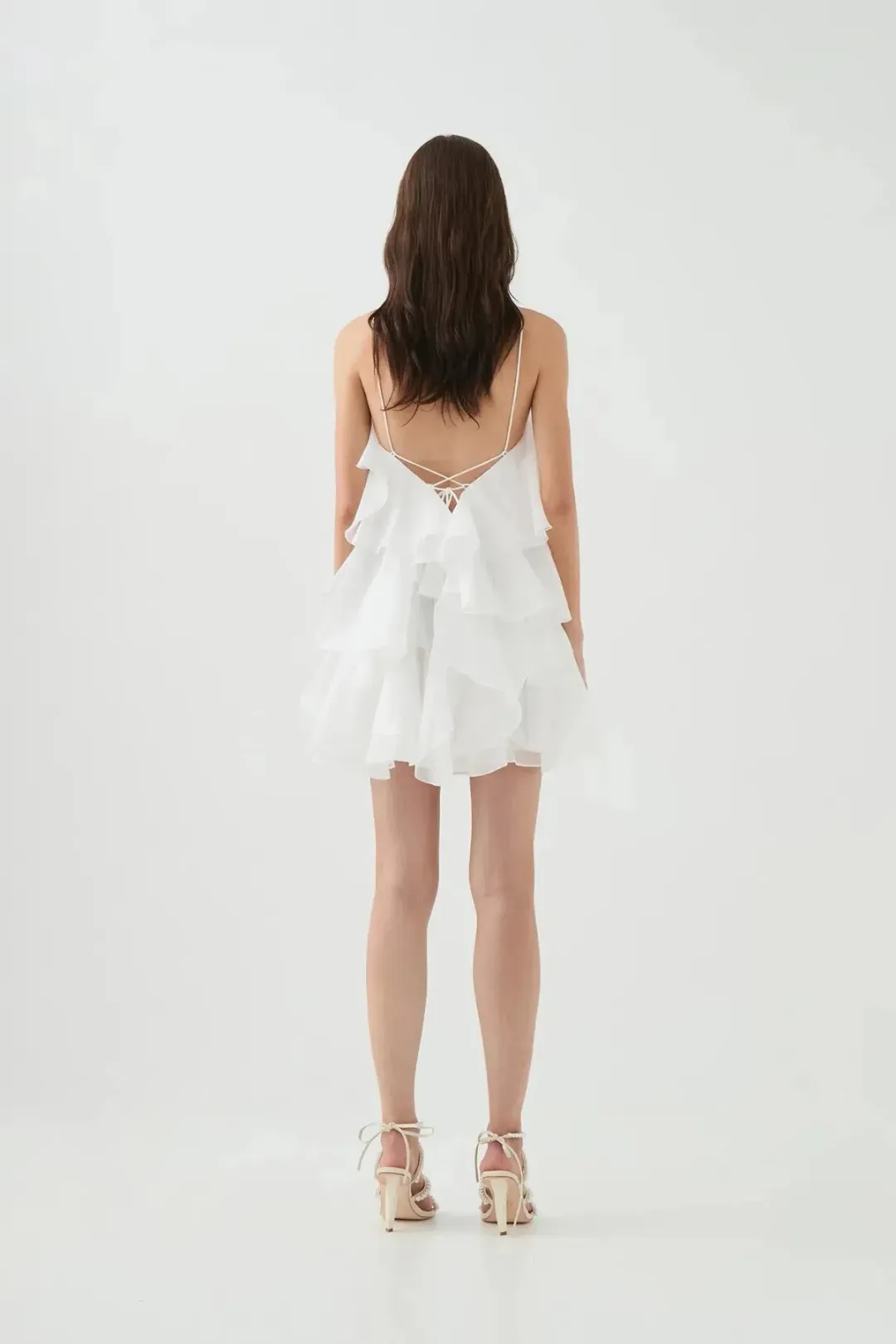 Aje Pandorea Layered Mini Dress in Ivory Size AU 10 for rent on The Volte - main image