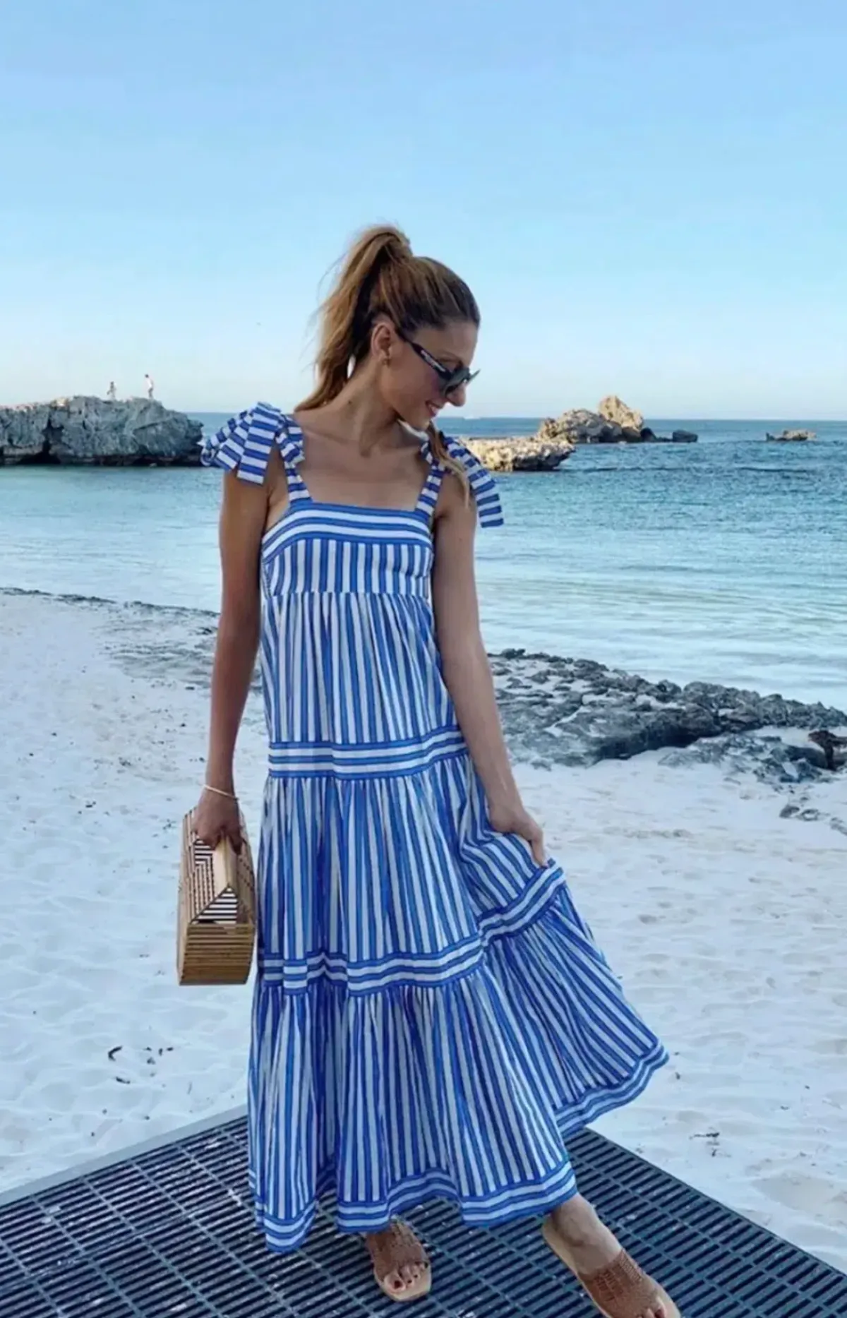 Zimmermann Verity Striped Tiered Maxi Dress in Blue Stripe Size AU12 for rent on The Volte - main image