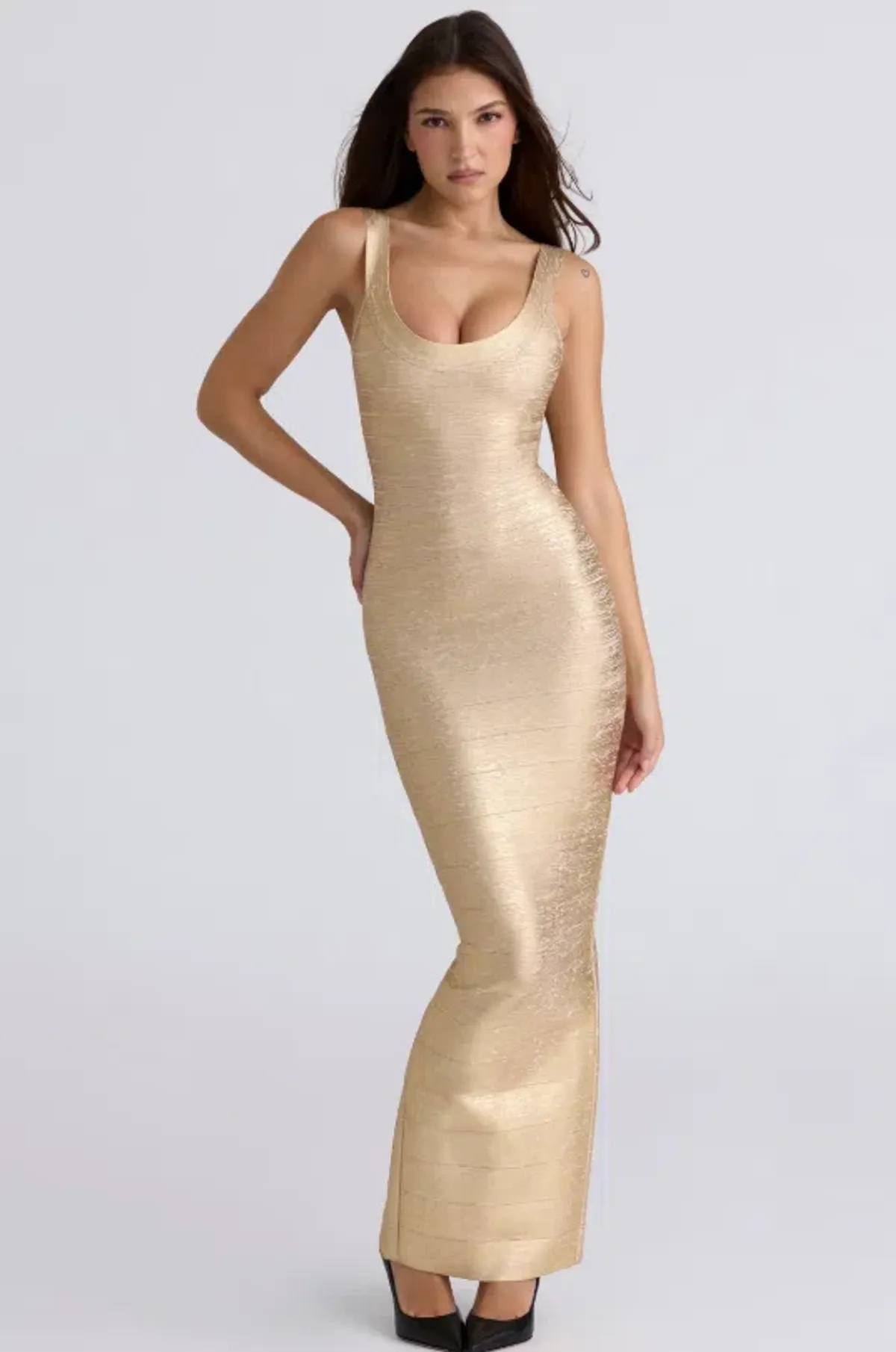 HOUSE OF CB The OG Gold Bandage Maxi Dress Size XS for rent on The Volte - main image