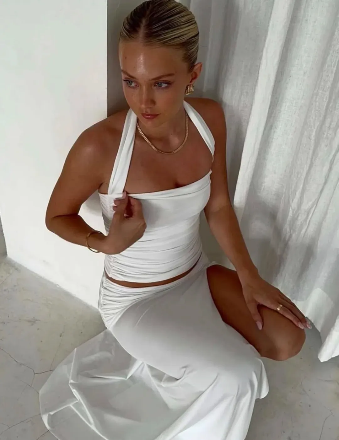 Mode Mila Kai Halter & Remi Skirt Set in size small  for rent on The Volte - main image