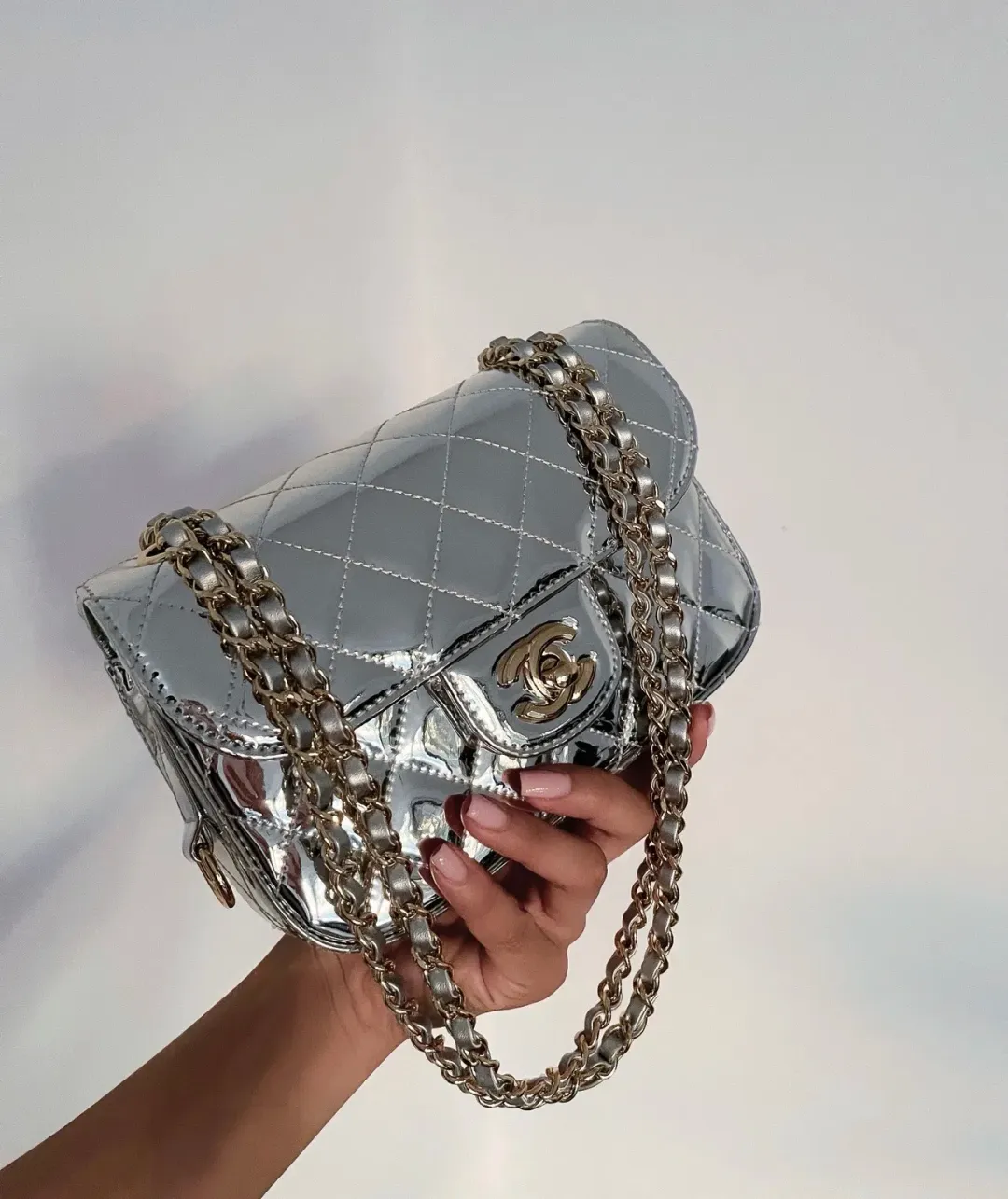 Chanel Silver Mini Flap Handbag for rent on The Volte - main image