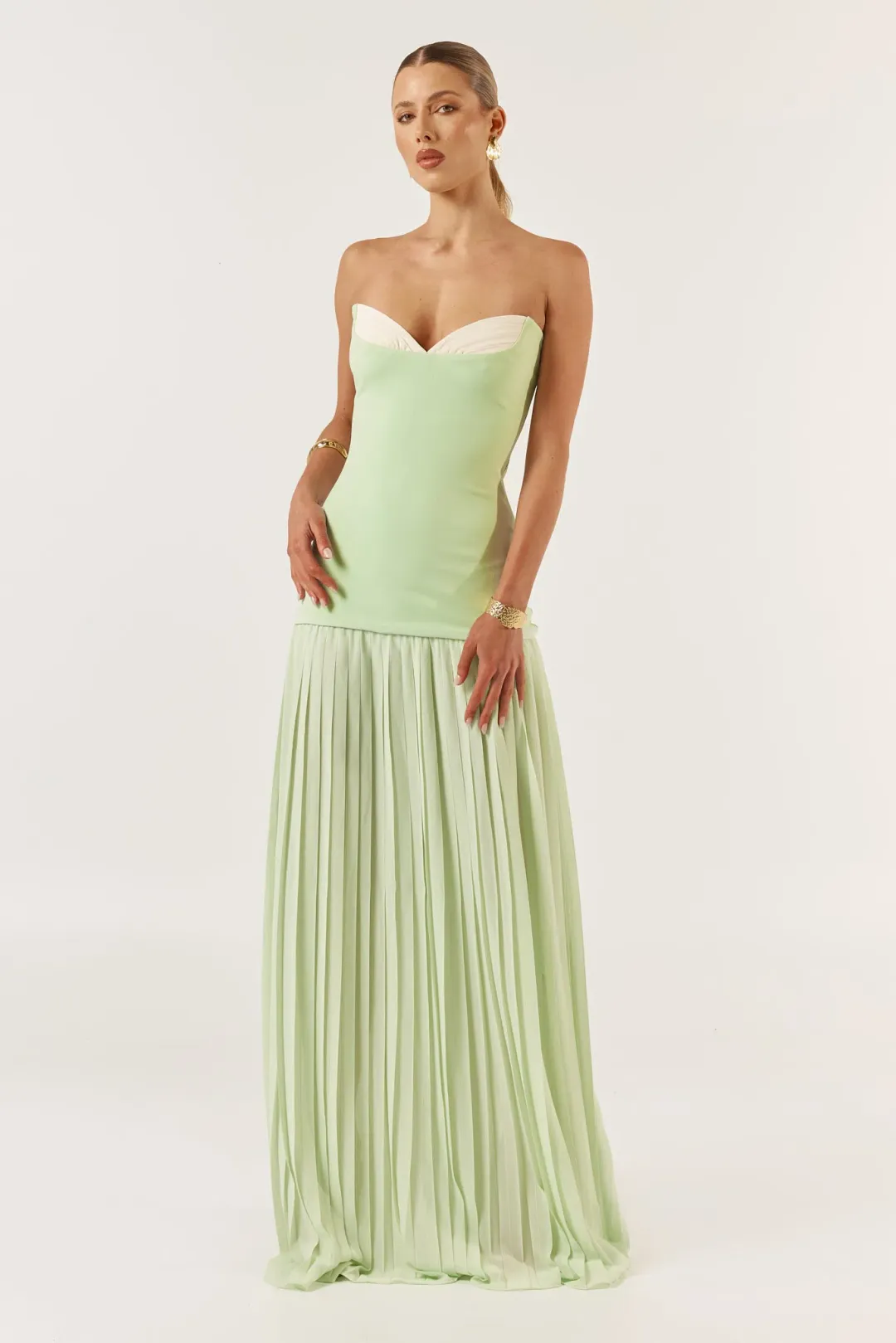 She is OLLÁ / Jefre Sei Nicolette Maxi Dress in Mint Size S / AU 8 for rent on The Volte - main image
