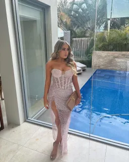 Pink custom made couture dress for rent on The Volte - image 3