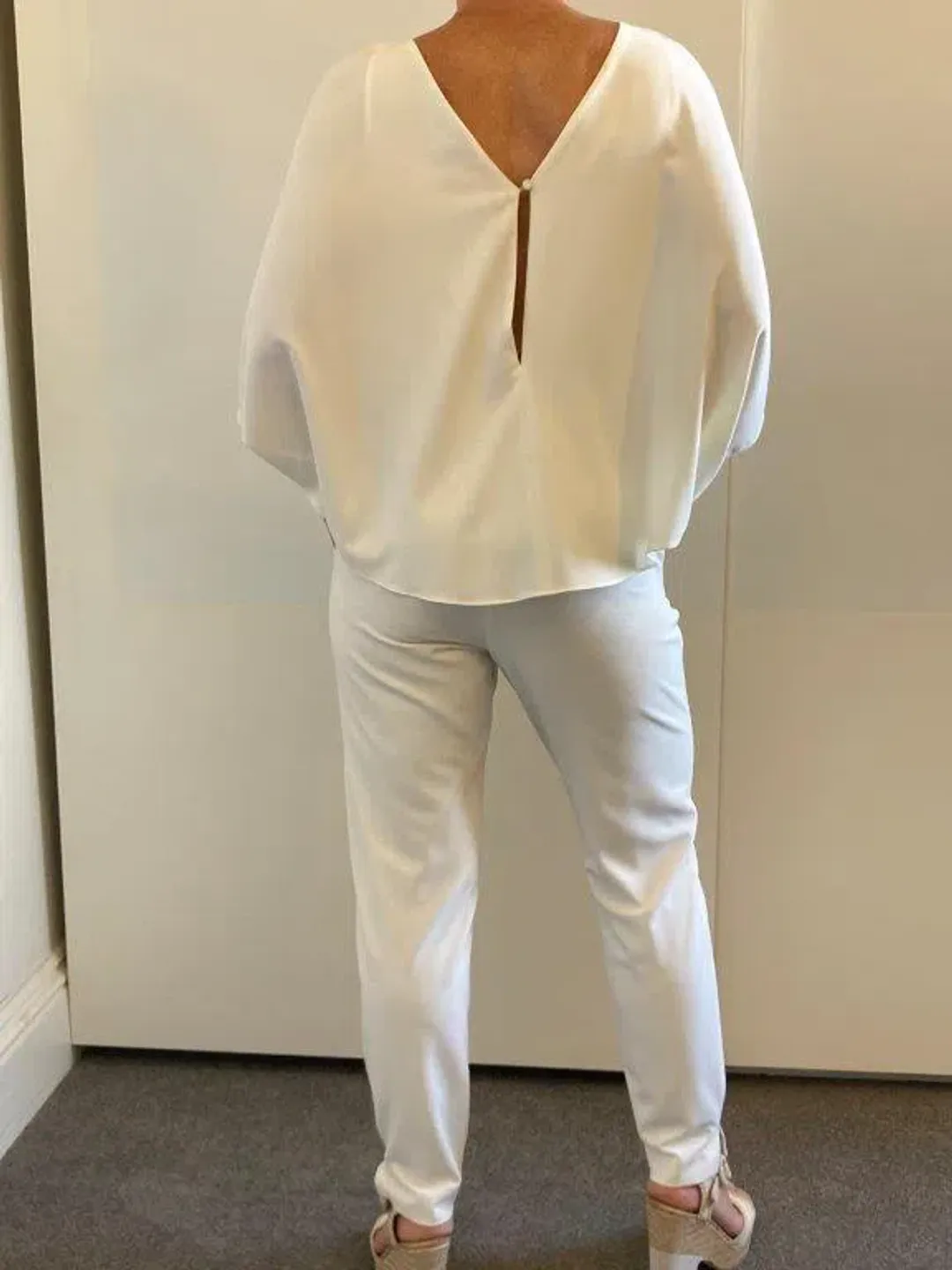 Halston Draped Crepe de Chine Jumpsuit White Size 8 for rent on The Volte - main image