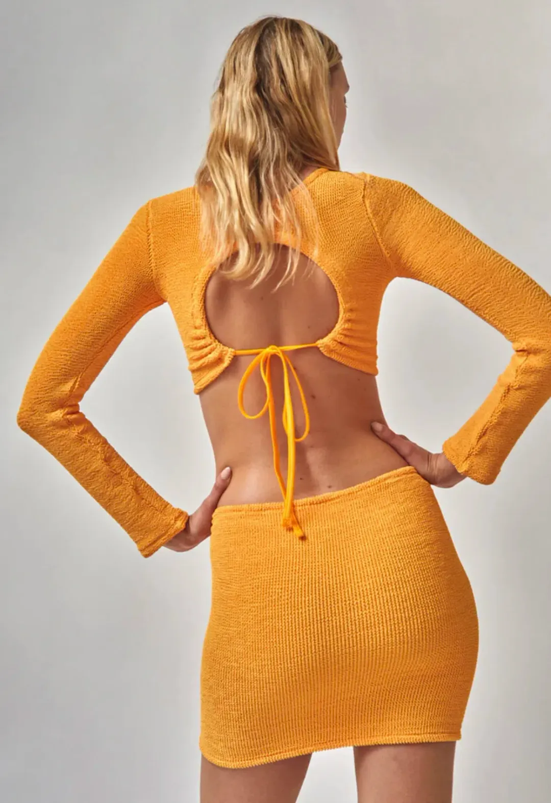 Hunza G Celeste Top and Mini Skirt Set Mango Sorbet One Size for rent on The Volte - main image