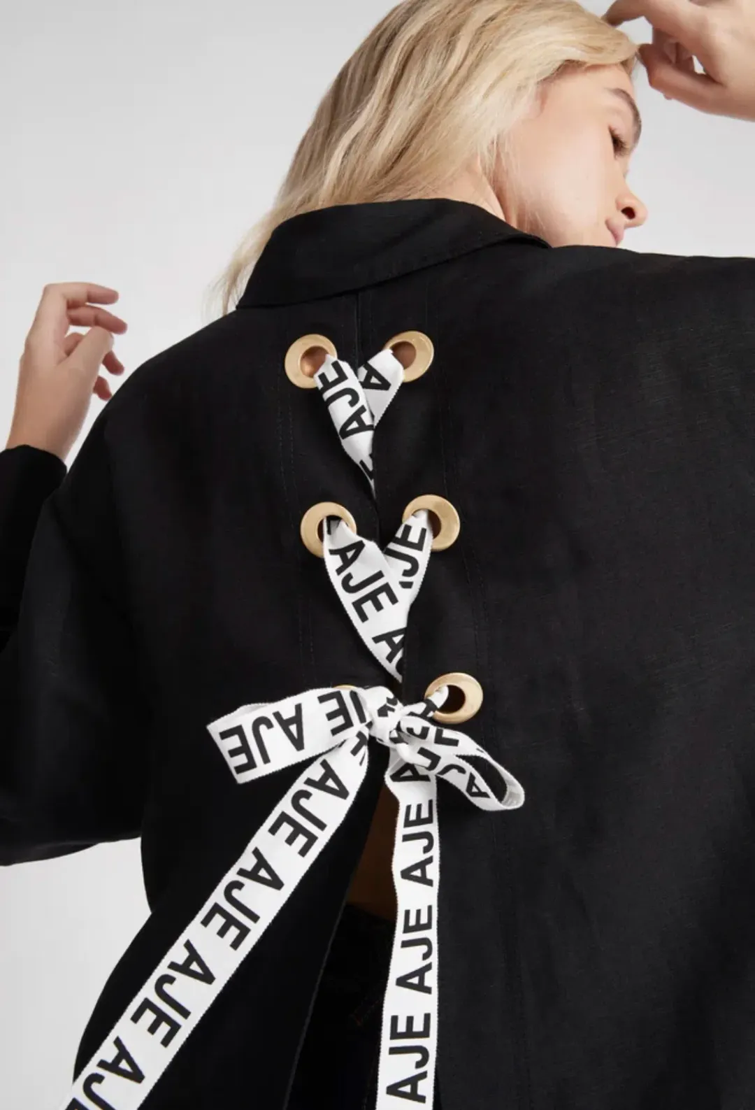 Aje Virtuous Lace-Up Longline Shirt In Black Size 10 for rent on The Volte - main image