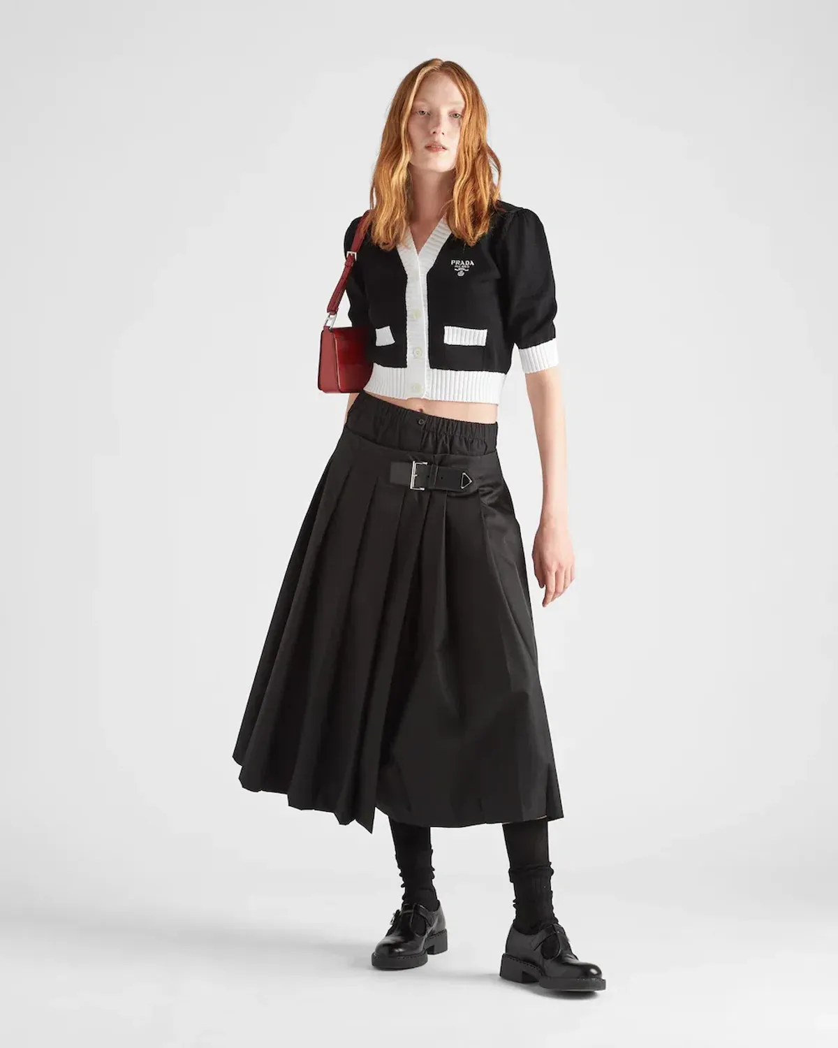 Prada Cropped Cotton Cardigan Black Size AU 6 for rent on The Volte - main image