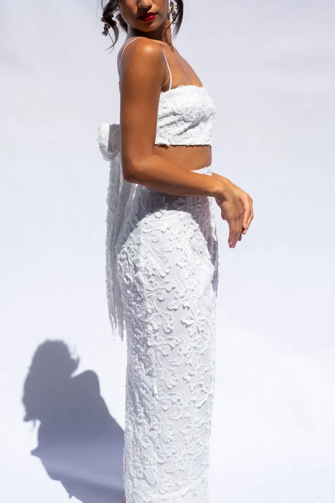 Isabella Longginou Textured Bow Tie Crop and Fitted Pencil Skirt Set White Size 6 for rent on The Volte - main image