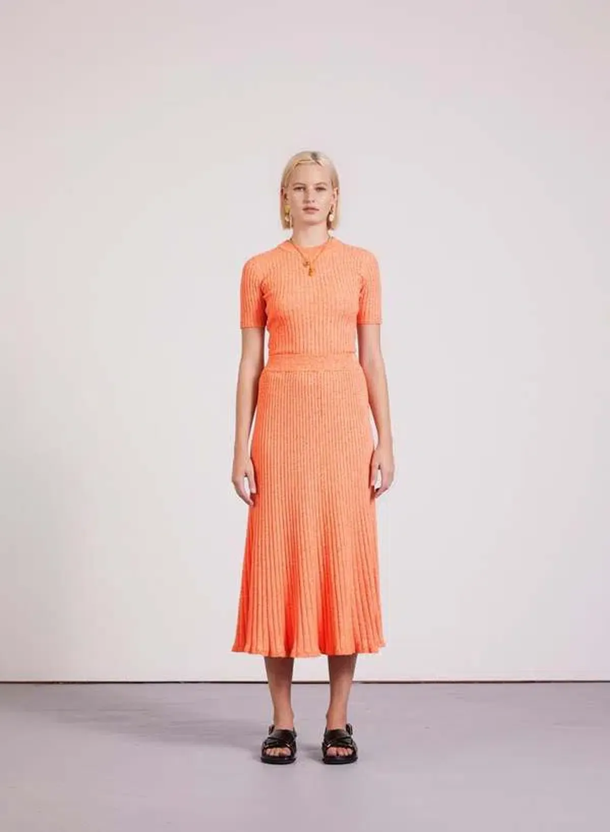 Anna Quan Bebe Top and Felicia Skirt Ribbed Knit Set Orange Zest Size AU 6 for rent on The Volte - main image