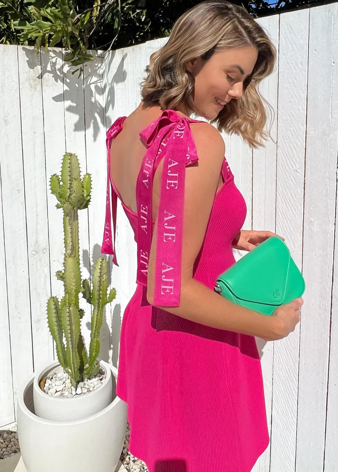 Aje Amber Knit Tie Shoulder Mini Dress Pink Size Small for rent on The Volte - main image