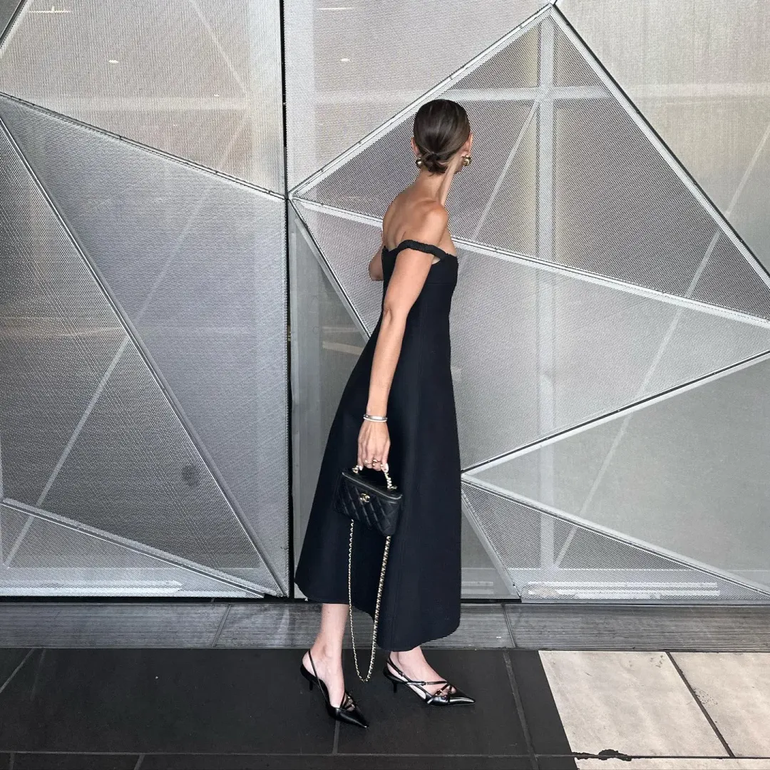 Khaite NY black midi dress  for rent on The Volte - main image